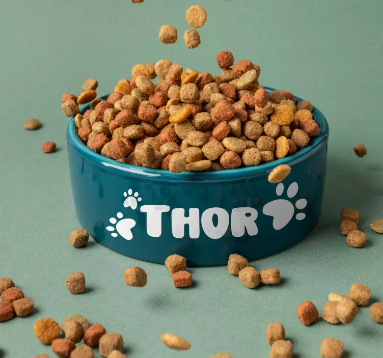 Sticker avec prénom pattes de chien - TenStickers