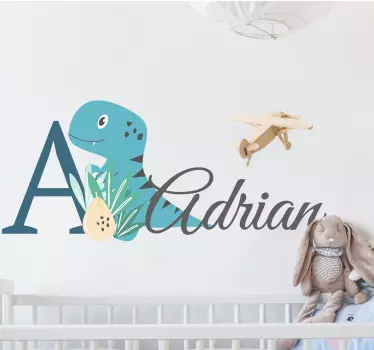 Sticker bébé dinosaure bleu avec prénom - TenStickers