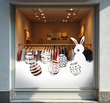 Sticker vitrine lapin et œufs de pâques dans le pré - TenStickers