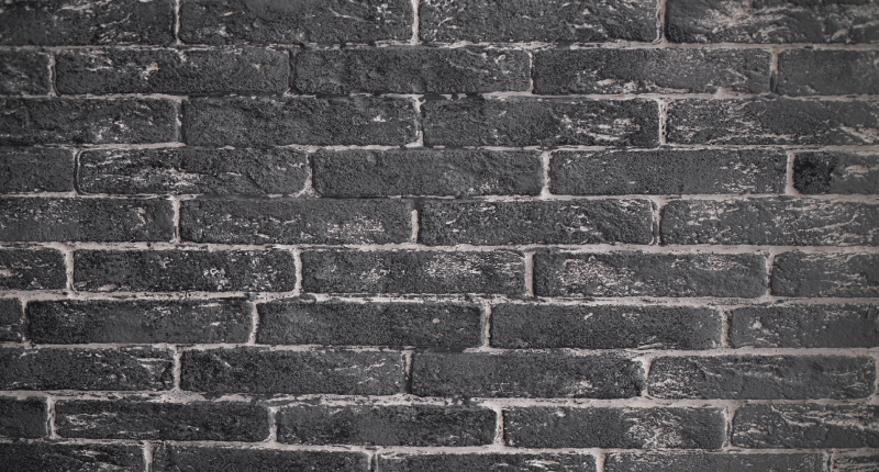 Tapis vinyle pierre brique noire chic - TenStickers